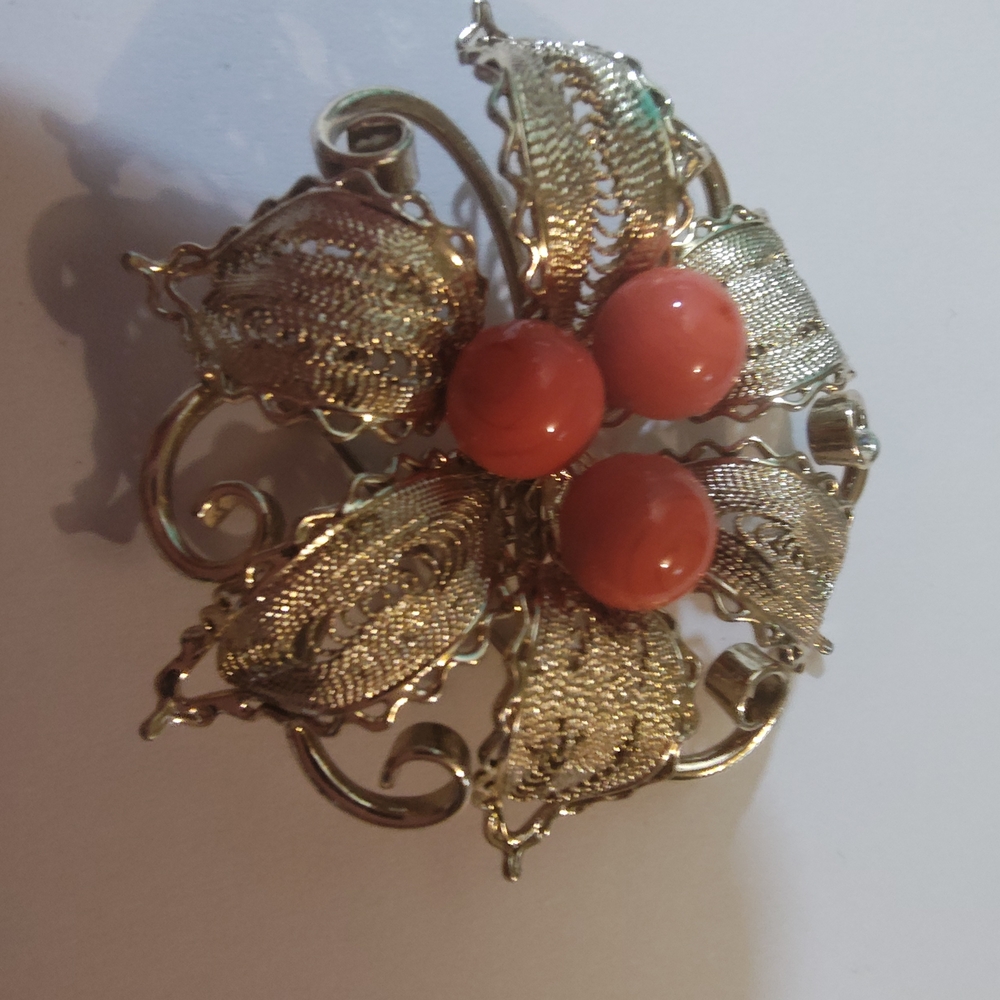 Elegant Gold and Coral Brooch